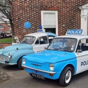Two preserved British police cars